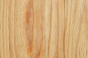 hellbraune Holzwand an einem Bauzaun mit Astlöchern