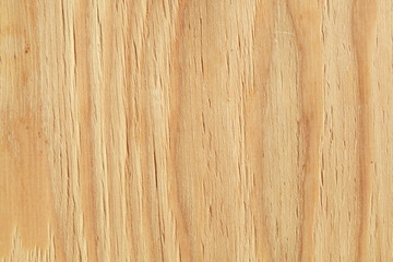 Obraz premium hellbraune Holzwand an einem Bauzaun mit Astlöchern