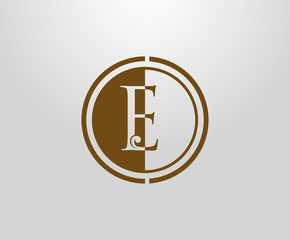 Circle E Letter Stamp logo. Graceful royal style Initial E. Vintage letter drawn emblem for book design,wedding invitation, brand name, business card, Restaurant, Boutique, Hotel.