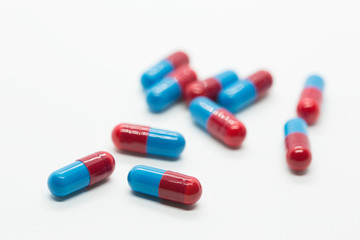 prescription pills on white background closeup
