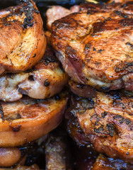 Assorted delicious grilled meat with vegetables over the counter on a barbecue event.