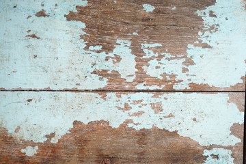 Light blue wood texture, blurry background