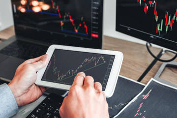 Business man deal Investment stock market discussing graph stock market trading Stock traders concept.