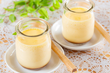 Homemade pudding on race place mat background - 手作りプリン