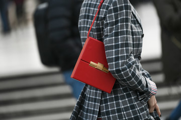 Street style accessories – Red leather shoulder bag with a metallic golden detail –...