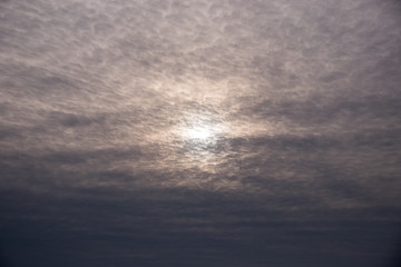 Sunset by the sea in clouds