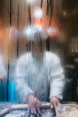 Behind the blurred glass