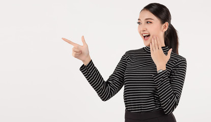 Beautiful young asian business woman in smart casual wear having showing empty hand and smile...