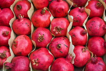 Fresh pomegranate for sale during street food festival.