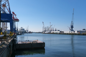 Fototapeta premium Industrial area in the Port of Rotterdam in The Netherlands. port of rotterdam zuid holland/netherlands products terminal europoort/calandkanaal