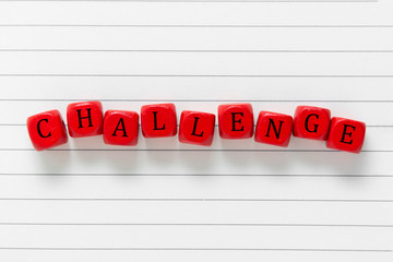 Challenge inscription, red blocks on notepade page. Online learning, home working, social media challenges.