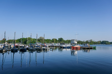 Fototapeta na wymiar Sailing boats in the harbor at summer
