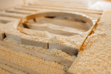 Wood shavings after working on CNC drilling machine