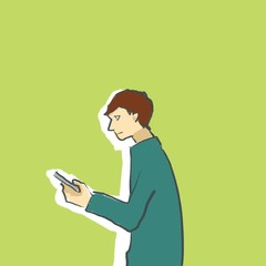 携帯（スマホ）を見る男性の横顔（カラー２）