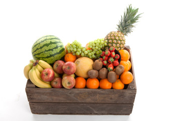 Wooden basket filled with fresh fruit