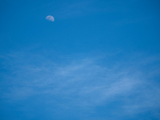 moon in the sky during the day