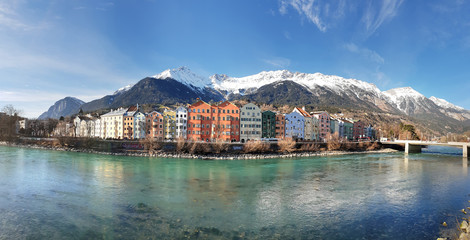 Panoramic view of Innsbruck with colourful houses along Inn river