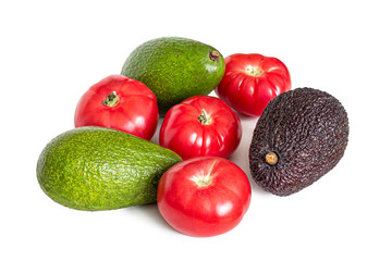 Tomatoes and avocado for vegetable salad, on a white background