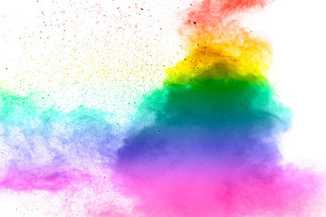 Colorful background of pastel powder explosion.Rainbow color dust splash on white background.