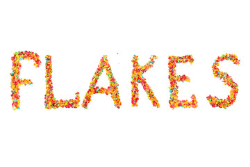 Colorful fruit cereal flakes lettering. The inscription Flakes done with multicolored fruit breakfast corn flakes. Traditional american morning snack