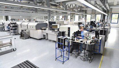 modern industrial factory for the production of electronic components - machinery, interior and...