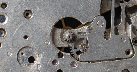 old clockwork, metal gears close up
