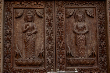 Fototapeta na wymiar Details at Swayambhunath Temple Complex - Buddhist Center and Village on the Outskirts of Kathmandu in Nepal