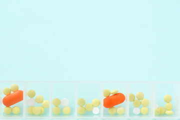 Assorted pharmaceutical medicine pills and capsules. Tablets background. Bunch of different pills. Healthcare