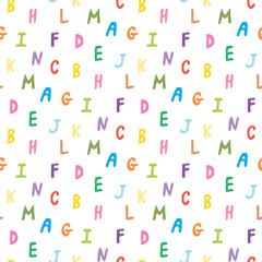 Seamless pattern with multicolored letters on white background. Vector image.