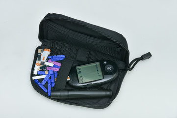 Diabetes set with glucometer, lancet, spare needles. Blood sugar ...