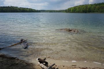 Crystal clear Peetschsee located in Stechlin conservation area, Brandenburg Germany             