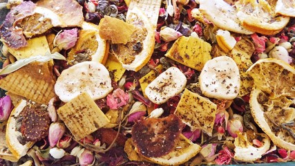 Dried grass, berries, berries are mixed, blended to make tea. autumn tea. Close-up. Selective focus...