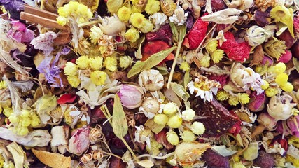 Dried grass, berries, berries are mixed, blended to make tea. autumn tea. Close-up. Selective focus...