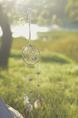 Dreamcatcher at sunset on the river.