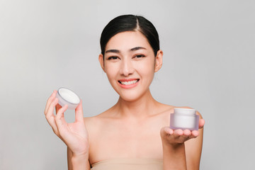 Beauty concept,Young beautiful asian woman with clean and bright skin, Holding Cream jar ,Nourishing cream products