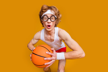 Close-up portrait of his he nice funky motivated focused worried guy holding in hands ball soccer...