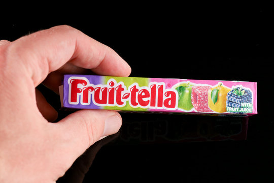 LVIV, UKRAINE - April 30, 2020: Fruittella chewing gum and candy in the hands
