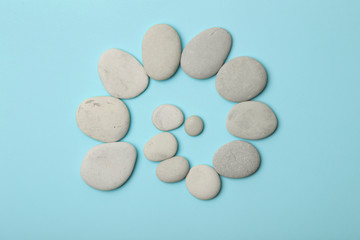  Zen background blue color with Japanese stones (stone towers) for spa, meditation and relaxation.