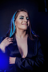 modern angel on a black background with blue light