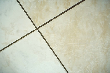 Floor tiles with intersecting lines