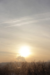 The sun sets over the winter park