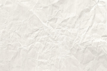 Obraz premium Crumpled soft yellow paper background texture