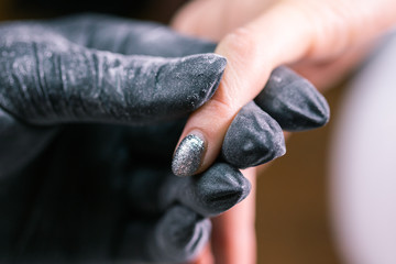 Close-up of hardware milling cutter for removing gel polish. Apparatus manicure in beauty salon....