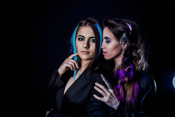 two informal girls with bright hair