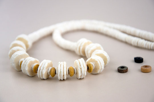 African ostrich eggshell necklace and wooden beads