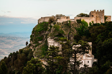 Fototapeta na wymiar Amazing view of Torretta Pepoli Castle and Venus Castle (Castelllo di Venere), situated on Erice Mountain. Landscape shot in Erice, Sicily, Italy. 