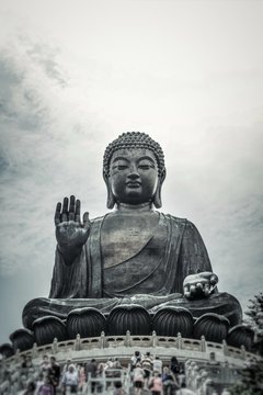 Low Angle View Of Buddha Statue Against The Sky