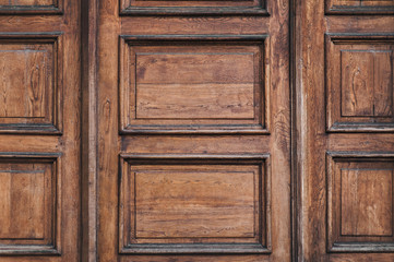 Old wooden brown door. Nature vintage background with copy space.