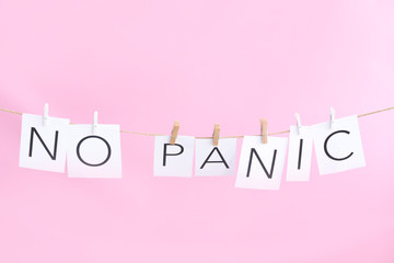 Text NO PANIC on white paper. Stop virus. Coronavirus pandemic. Copy space.