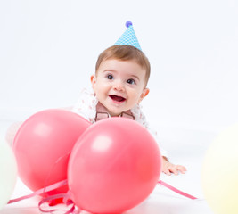 Baby birthday party with ballons